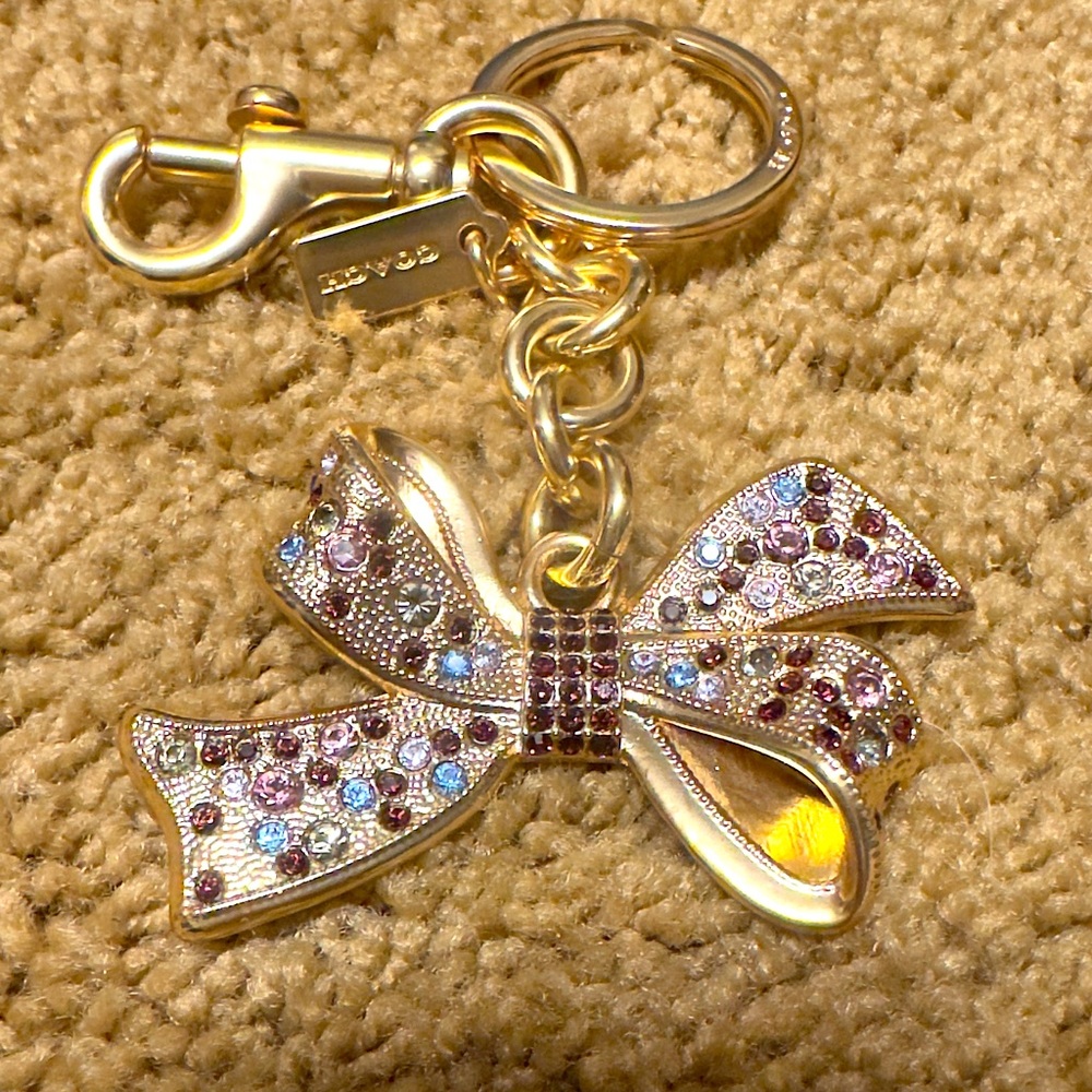 COACH gold metal & colored rhinestone sparkly bow keychain bag charm.